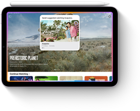 Un iPad mini en posición horizontal con un Apple Pencil apoyado sobre el borde superior. En la pantalla se muestran las distintas funciones de multitasking y las nuevas funcionalidades de Apple Intelligence del iPad mini