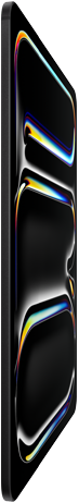 iPad Pro, parte frontal, negro espacial, estructura de aluminio y vidrio, perfil delgado, inclinado hacia atrás, la pantalla muestra un arte lineal de muchos colores